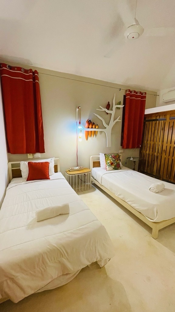 Habitación twin familiar con dos camas y baño en suite en villa Las Terrenas